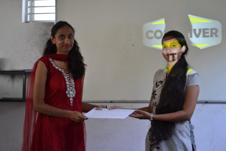 Supervisor Aishwarya awarding Intern Aishwarya CJ