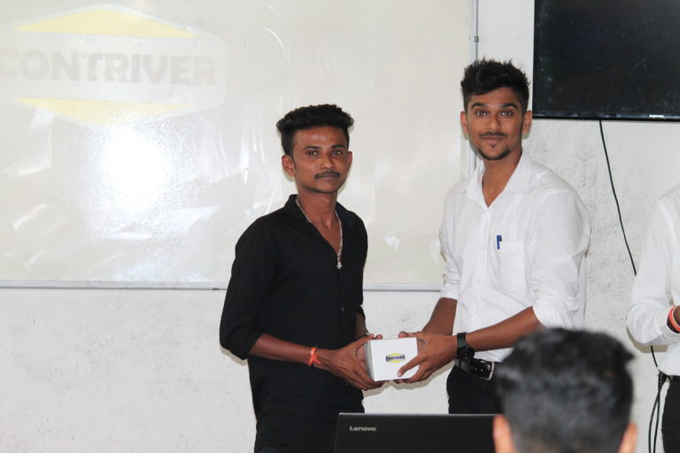 Supervisor Salman awarding Intern Manoj